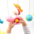 Kép 5/6 - Körhinta a kiságy fölé világító vetítővel  Baby Mix piros